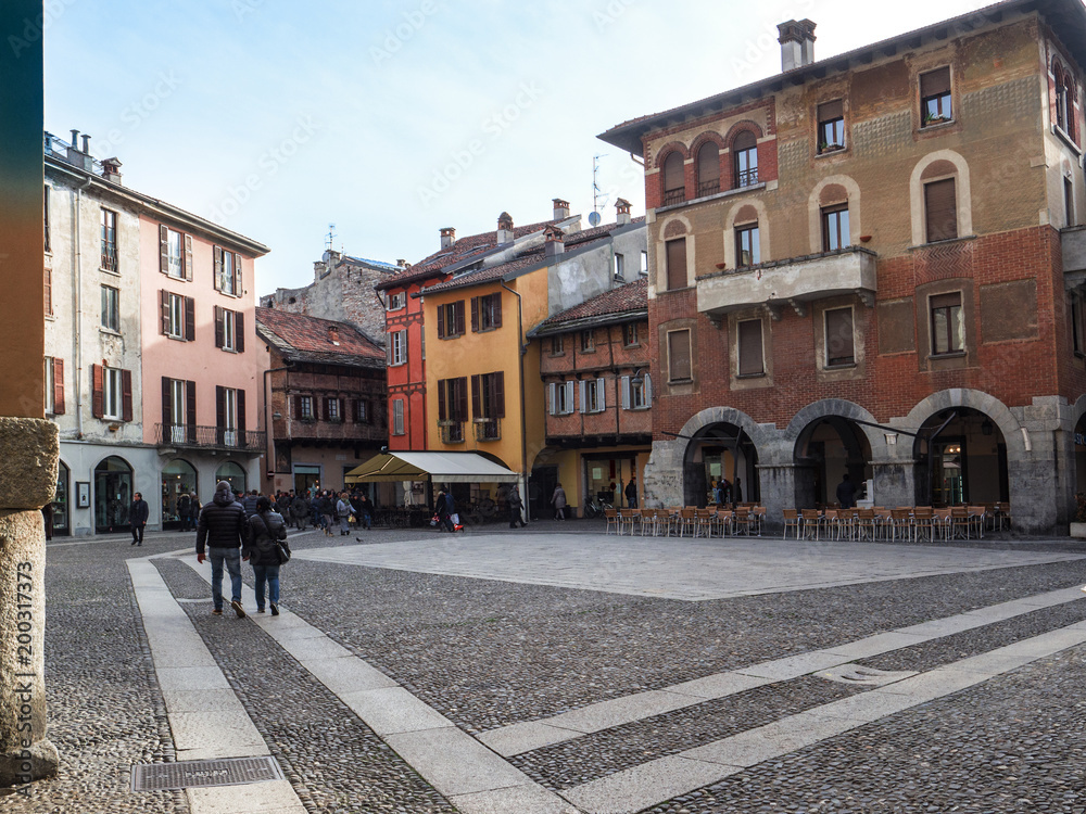pedestrian island in a beautiful square of Como with historic buildings.italy