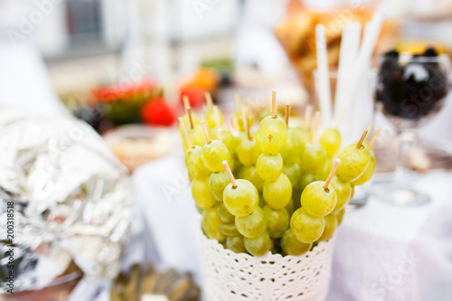 White grapes on toothstick photo