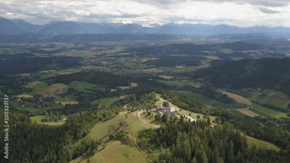 AERIAL view of Magdalensberg, Carinthia, Austria. Mountains as a background AERIAL view of Magdalensberg, Carinthia, Austria. Mountains as a background