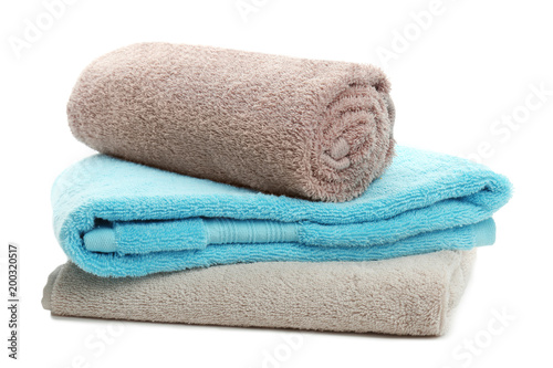 Clean soft towels on white background