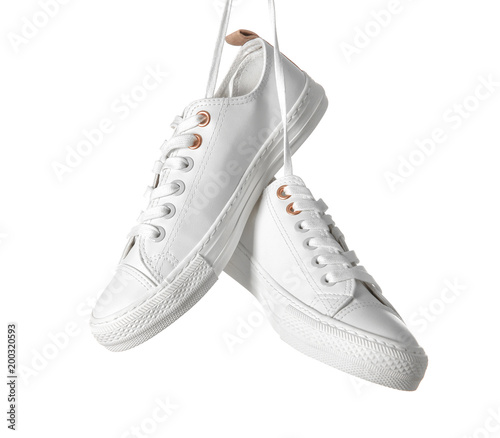 Pair of casual shoes on white background