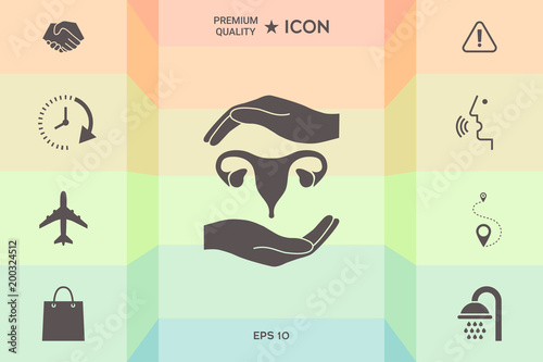 Hands holding Female uterus - protection symbol