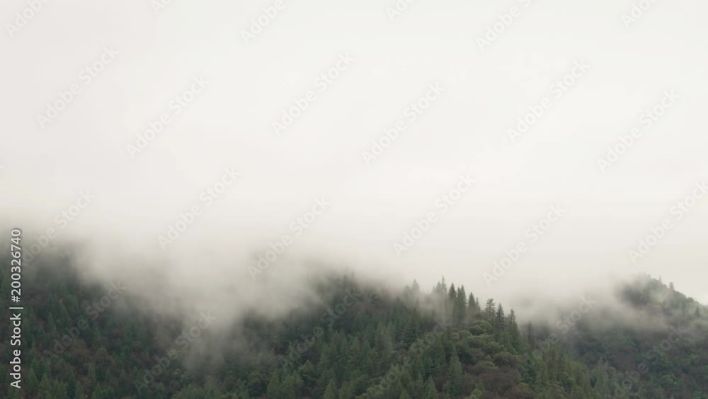 Time Lapse Of Dramatic Winter Storm And Fog Moving Over A Mountain Peak Time Lapse Of Dramatic Winter Storm And Fog Moving Over A Mountain Peak