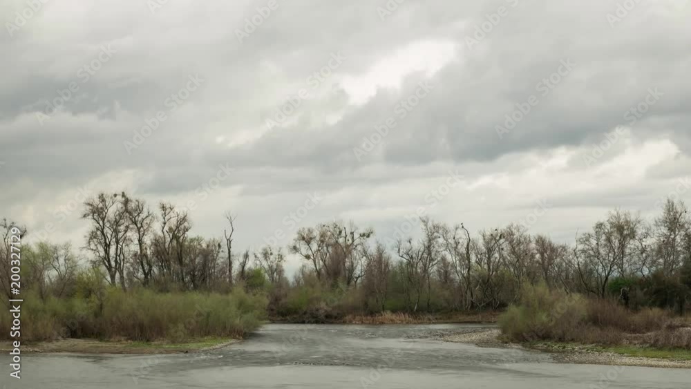 Day To Night Time Lapse Of Dramatic Storm Clouds Passing Over The Feather River Day To Night Time Lapse Of Dramatic Storm Clouds Passing Over The Feather River