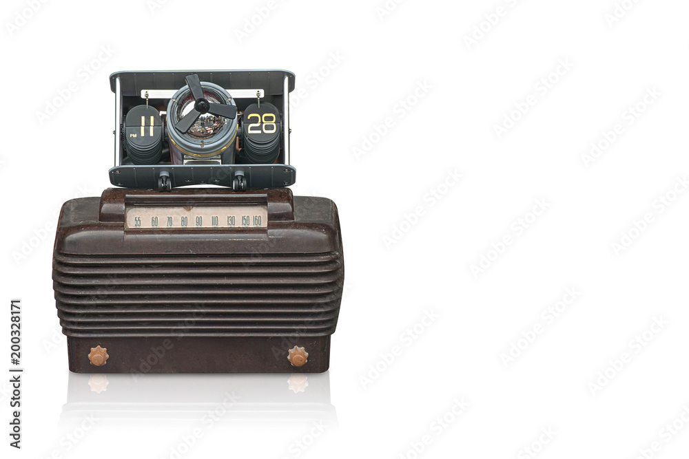 front view black airplane calendar on brown radio white background,copy space front view black airplane calendar on brown radio white background,copy space