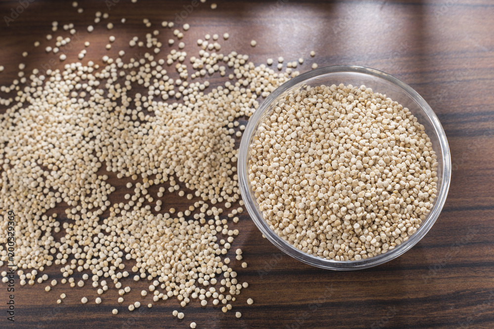 quinoa beans in bowl on rustic wooden background quinoa beans in bowl on rustic wooden background