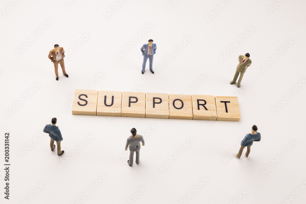businessman figures meeting on support word businessman figures meeting on support word