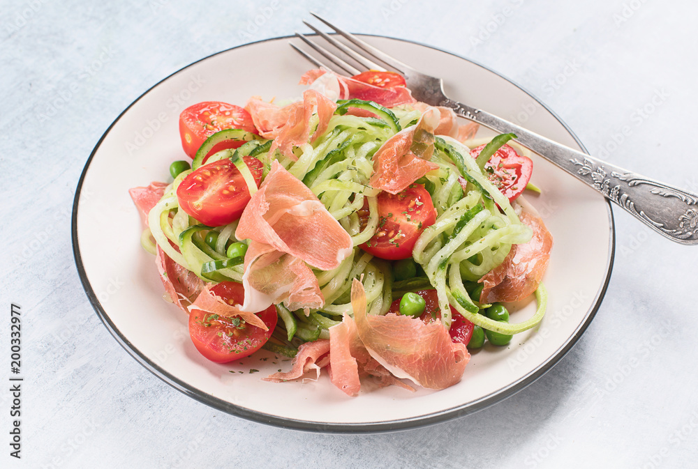 Cucumber and tomato salad with prosciutto