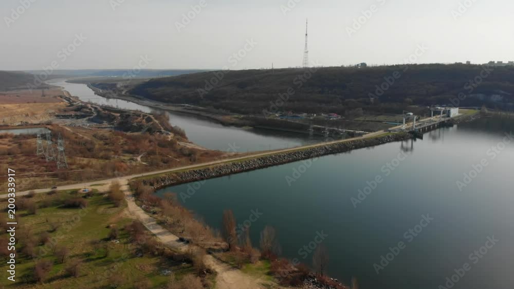 Aerial View from drone. Flying over the beautiful lake or river near mountains. Amazing Landscape panorama. Cinematic toned. Sunny beautiful day. Aerial View from drone. Flying over the beautiful lake or river near mountains. Amazing Landscape panorama. Cinematic toned. Sunny beautiful day.
