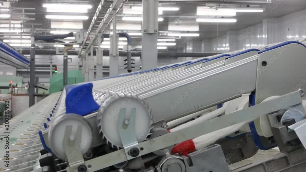 Machinery and equipment in the workshop for the production of thread. interior of industrial textile factory. the camera is stationary Machinery and equipment in the workshop for the production of thread. interior of industrial textile factory. the camera is stationary
