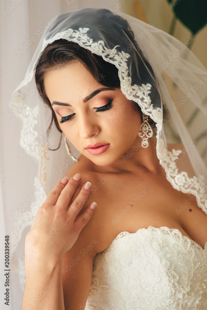 Portrait of the beautiful bride indoors Portrait of the beautiful bride indoors