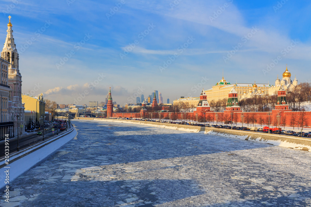 Frozen Moskva river on the background of Moscow Kremlin on a sunny winter morning