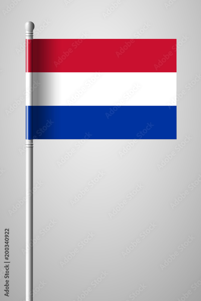 Flag of Netherlands. National Flag on Flagpole. Isolated Illustration on Gray Flag of Netherlands. National Flag on Flagpole. Isolated Illustration on Gray