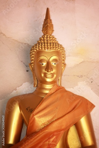 Buddha image god within gold colored in the ayutthaya historical park Thailand