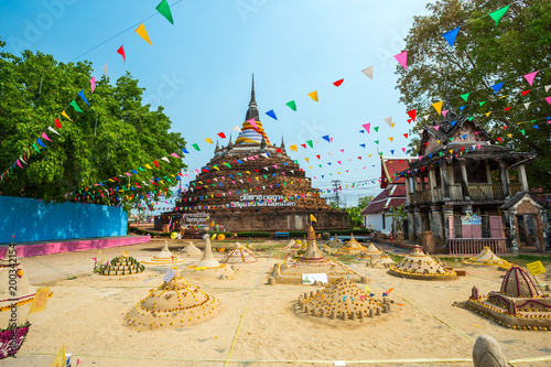 People attend construction the Sand Pagoda for return the sand to the temple on Songkran festival wat Rat Cha Bu Ra Na temple in Phitsanulok ,Thailand. April 12, 2018 photo