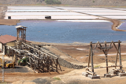 Cape Verde salt pans, base infrastucture  wood pylon; salt pans dried and a tourist salt swimming bath