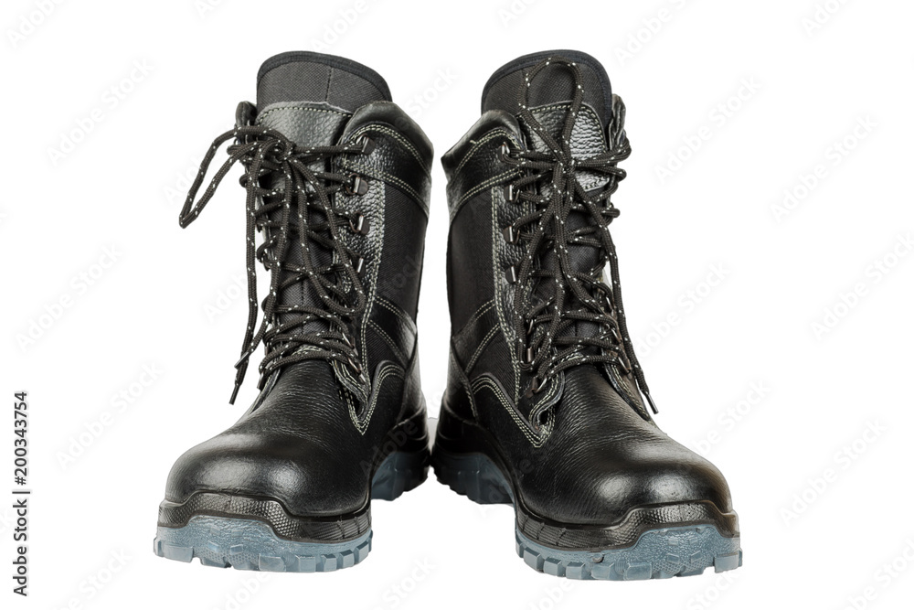 Black winter work boots isolated on white background