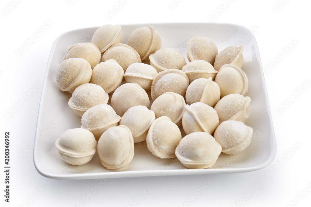 Frozen dumplings on the plate Frozen dumplings on the plate