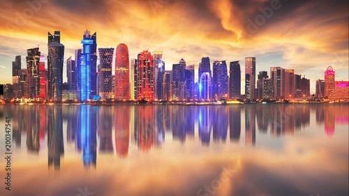 Skyline of modern city of Doha in Qatar, Middle East - Time lapse at sunset