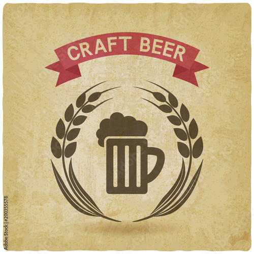 craft beer banner. mug of beer and ears of barley vintage background.