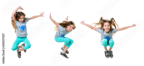 preteen jumping and enjoying her time, isolated