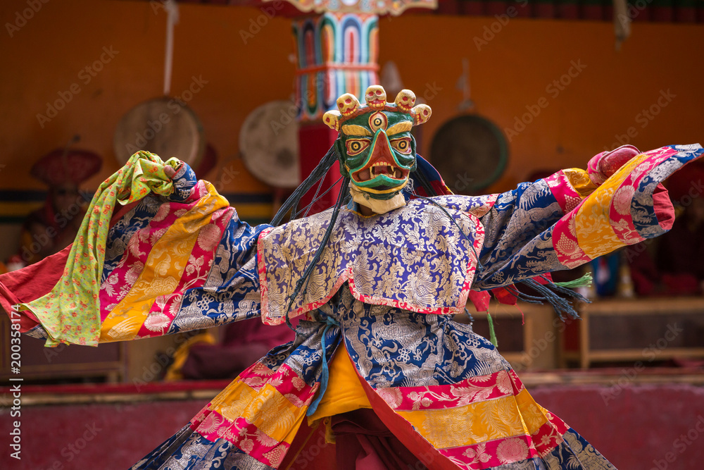 Unidentified monk in mask perform a religious masked and costumed mystery dance of Tibetan Buddhism during the Yuru Kabgyat Buddhist festival at Lamayuru Gompa, Ladakh.