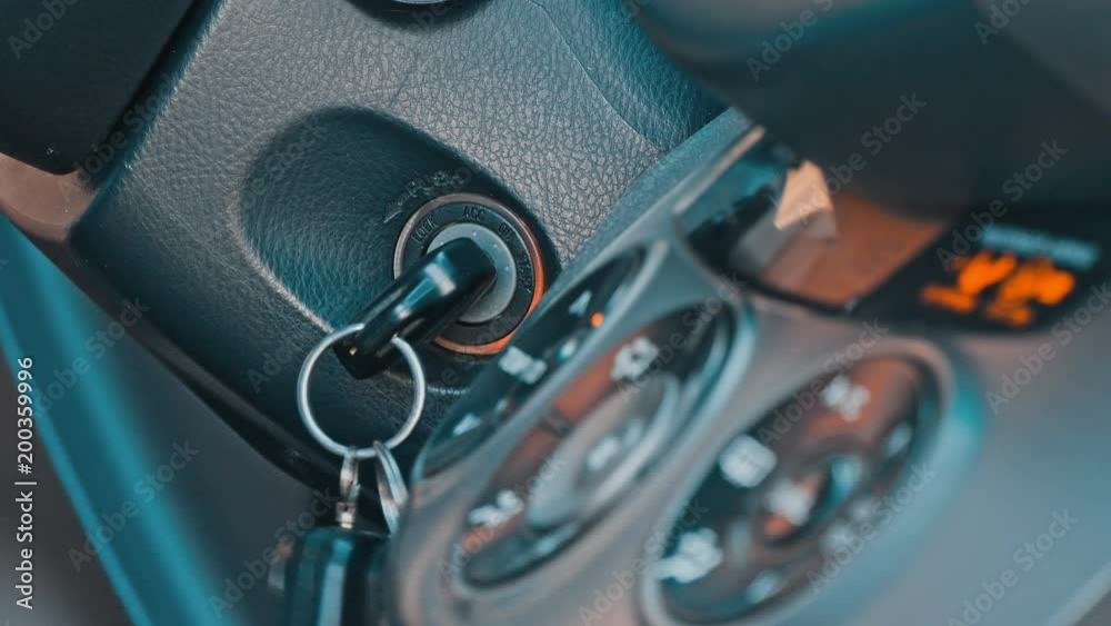 Hand adjusting the internal temperature of the car