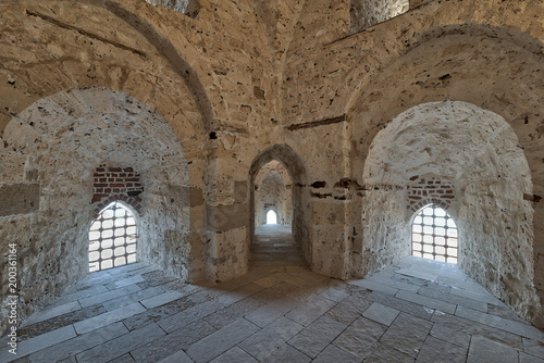 Three arches leading to windows on brick stone wall of a passage surrounding the Citadel of Qaitbay  Alexandria  Egypt