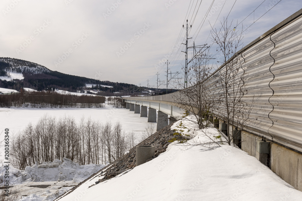 Fototapeta premium Part of Botnia railway trail a bridge over a sea bay
