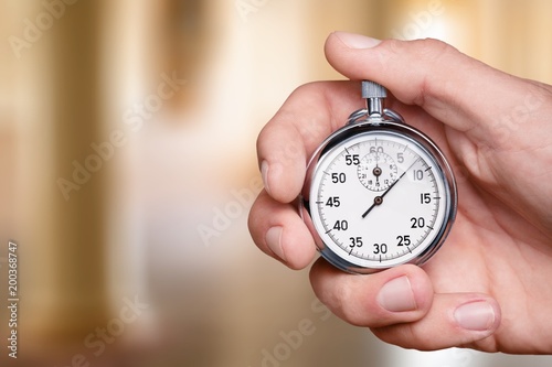 Close-up Stopwatch in Human Hand