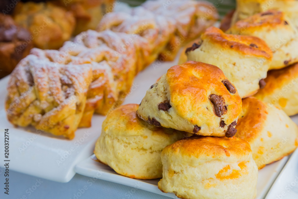 Breakfast Danish pastry and scone - Danish pastry and chocolate chip scone for catering at Spring Festival picnic event