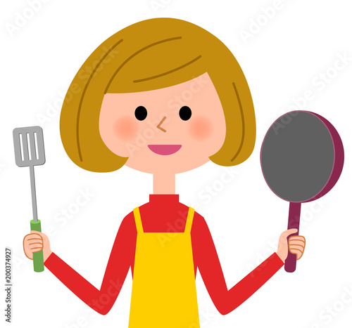 エプロンの女性　料理