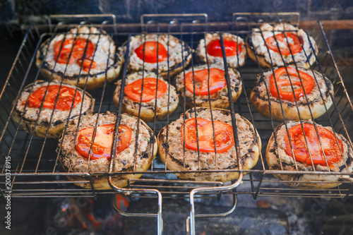 mushrooms with tomatoes roasted on the grill
