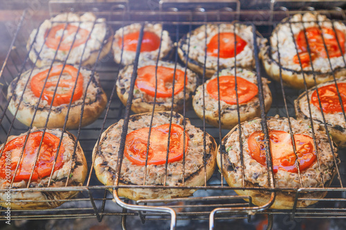 mushrooms with tomatoes roasted on the grill