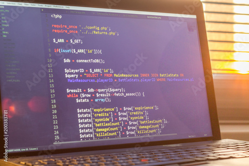 PHP back-end code. Computer programming source code. Abstract screen of web developer. Digital technology modern background. Code is created by myself.