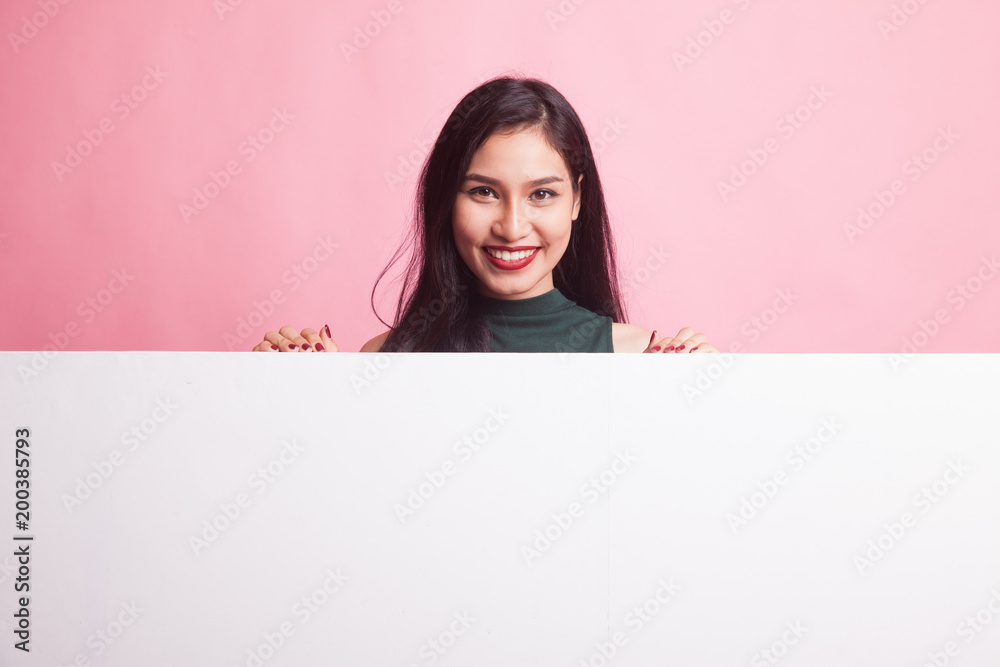 Young Asian woman with blank sign. Young Asian woman with blank sign.