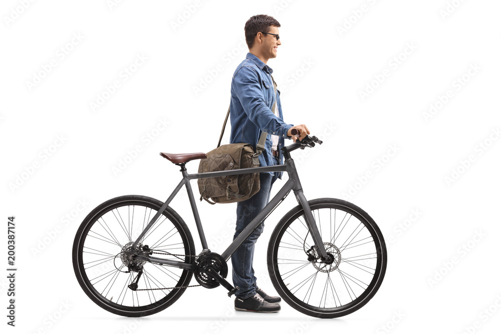 Young man with a bicycle waiting in line Young man with a bicycle waiting in line