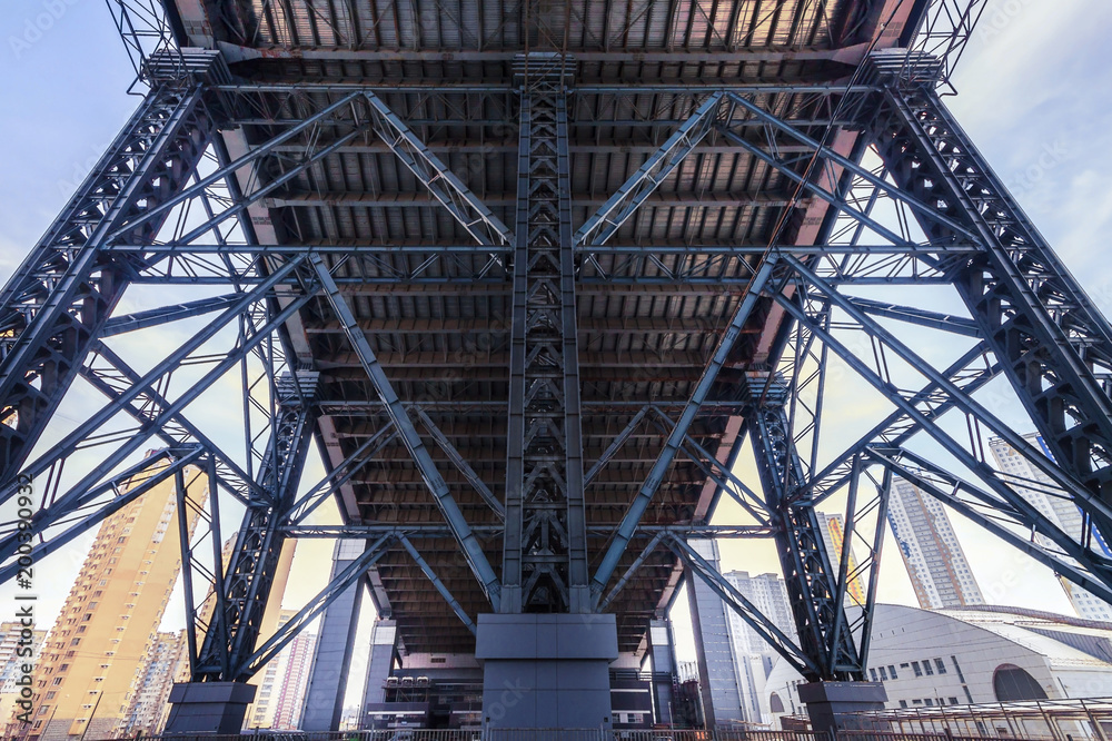 Under steel bridge structure skyway on the skyscraper background Under steel bridge structure skyway on the skyscraper background