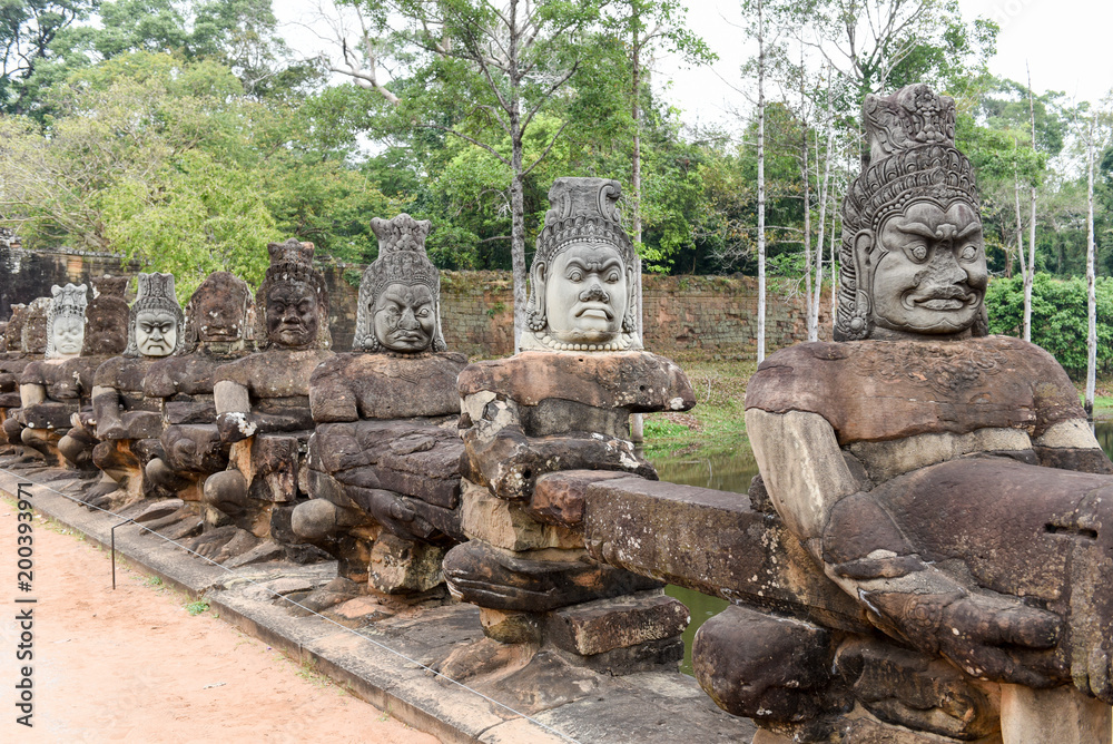 Sculptures of demons at south gate to Angkor Thom, Cambodia Sculptures of demons at south gate to Angkor Thom, Cambodia
