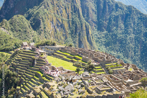 Machu Picchu terraces steep view from above to Urubamba valley below. Peru travel destination, tourism famous place.
