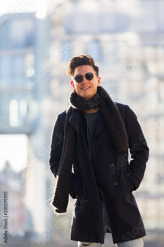 portrait of a wintry clothed young man