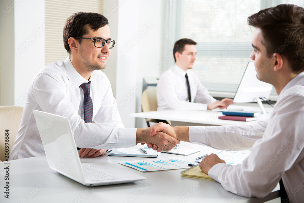Business people shaking hands Business people shaking hands