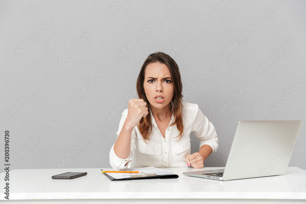 Portrait of a furious young business woman Portrait of a furious young business woman