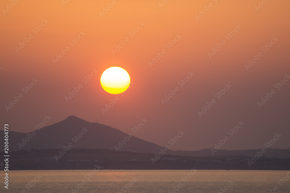 Beautiful Orange Sunset overs Naxos Island, Greece