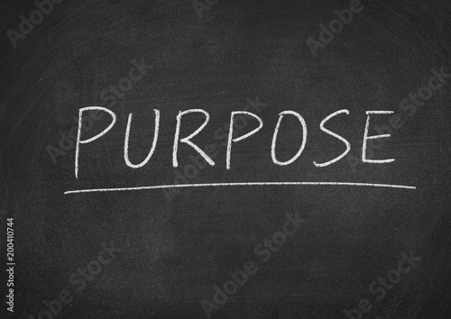 purpose concept word on a blackboard background