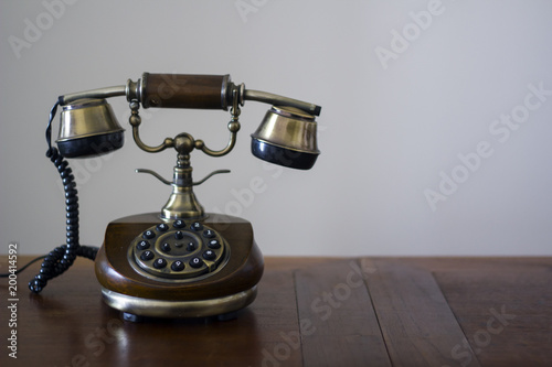 Vintage phone on wooden table