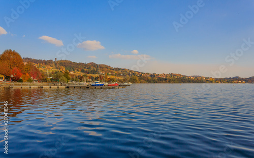 view of the lake of viverone in italy/ Lake Viverone is the third largest lake in Piedmont in Italy , It is a lake of glacial origin,and an important fish and tourist resource