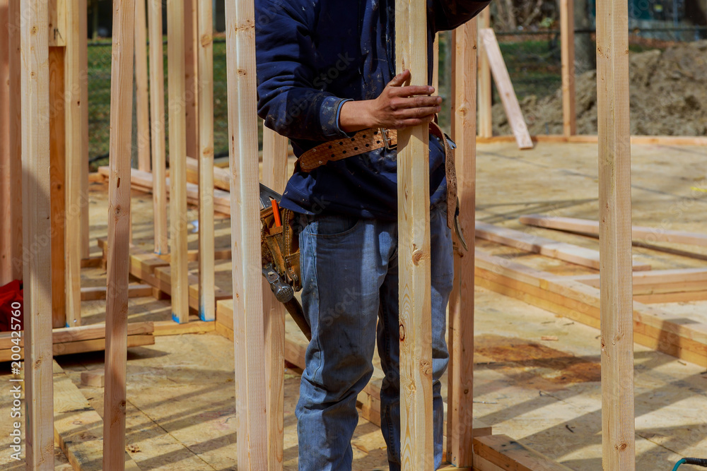 Nature contractor and the wooden frame of the cottage Nature contractor and the wooden frame of the cottage