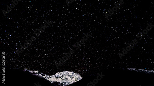 Background with lot of shiny stars on the black sky in Himalaya mountains, Nepal