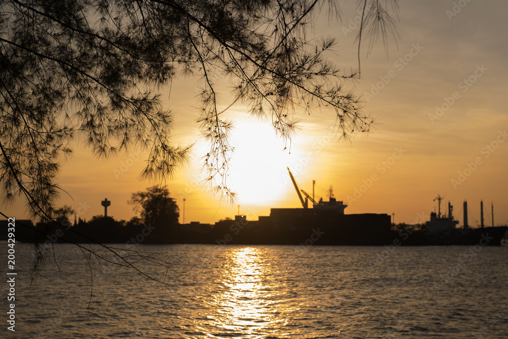 The sun fell into the water at the lake in the evening   